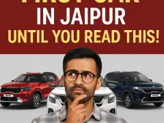 Man thinking with 3 KIA SUVs behind him; bold text says "Don’t Buy Your First Car in Jaipur Until You Read This!"