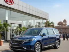 Kia Carnival on road price Jaipur at Rajesh KIA showroom, showcasing the luxury MPV with its elegant design.