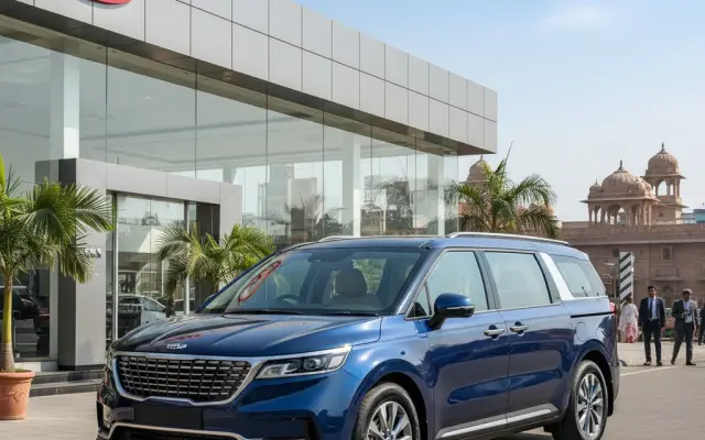 Kia Carnival on road price Jaipur at Rajesh KIA showroom, showcasing the luxury MPV with its elegant design.