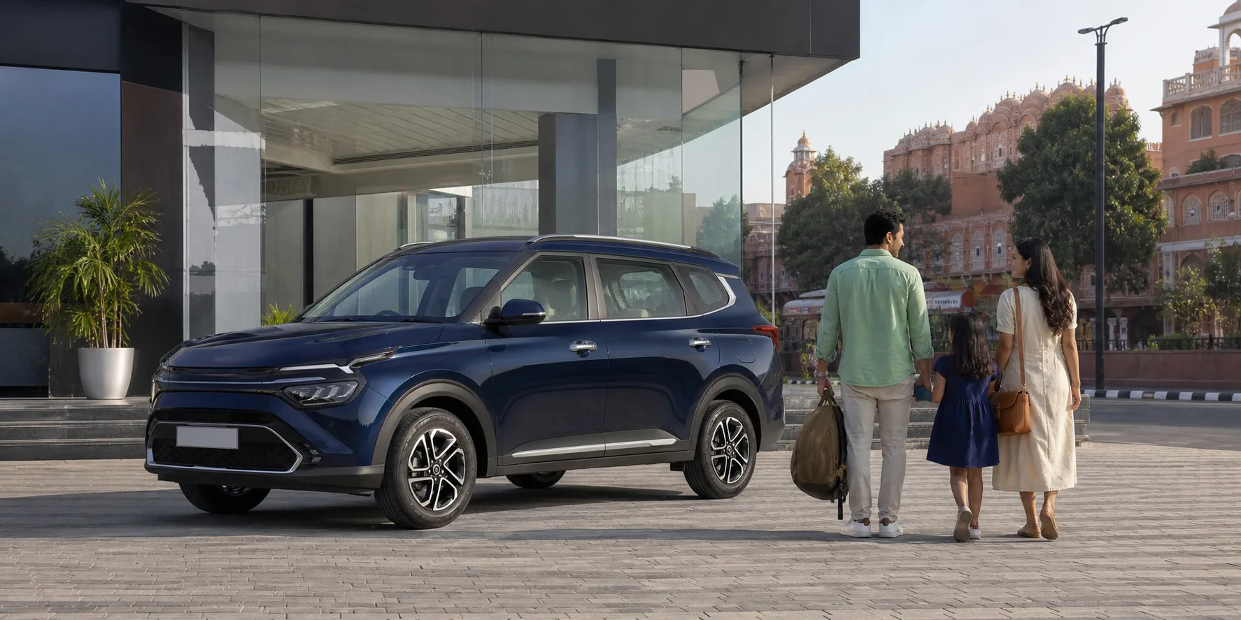 Best Kia Carens variant Bharatpur hero image showing a premium family MPV outside a Rajasthan dealership for buyers comparing variant value and booking budget.